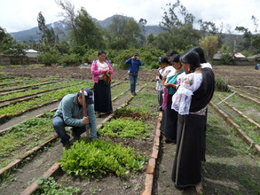 Parents Learning About Gardening at Demo Farm