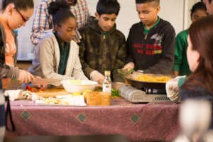 Students cook a healthy recipe with community chef