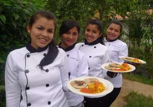 Ladies presenting a Salvadoran Traditional Dish