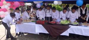 Youth participating in Gastronomic Fair