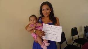 Cosmetology-Proud of her achievement with her baby