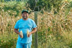 Ariel with the QPM harvest (photo by Alex Herrera)