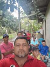 The group leader (red - shirt) with his group