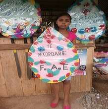 Youth are given lessons in making funeral wreaths