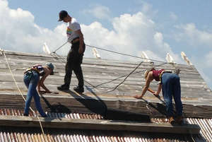 International volunteers building the walipini