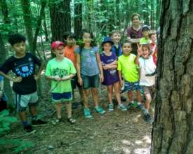 Miriam in the middle checking out the rat snake!