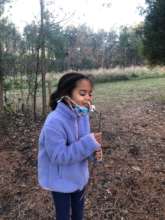 Elise chomps down on a perfectly toasted treat