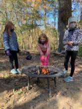 Eliza, Ruby, and Tara admire their handiwork