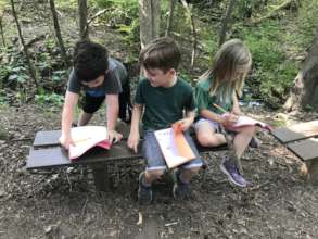 Earthkeepers Drawing in their Nature Journals