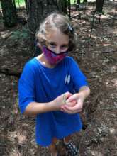 Phoebe shows off "Shiney," her caterpillar friend!