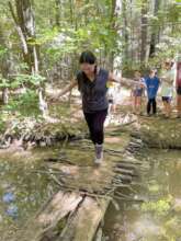 A counselor testing the bridge first!