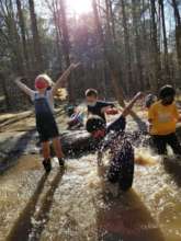 Afterschool campers get acquainted with a creek