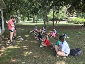Camp kids learning about Opossums with Olive