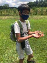 Aiden holding NC's state butterfly.