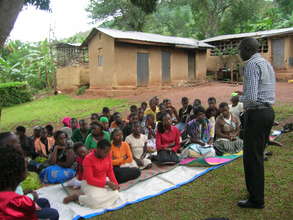 Project leader talks to girls