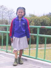 Sita beaming as she walks into a brighter future.