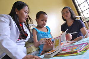 Project Lead Dr. Mae Dolendo & a patient