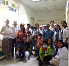 Liz, Ed, Dr. Dolendo, patients, families & medics
