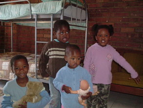 The 3 orphans and Maureen’ daughter in their new bedroom