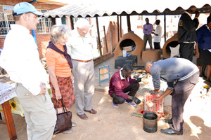 Our international guests observing candle-making