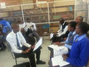 Students compiling project proposal