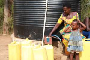 Mother and daughter selling water