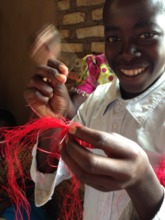 A young man trained to sew by Unite