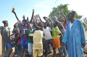 Community members celebrating water in Diabel