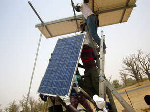 CREATE! technicians installing the solar panels