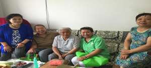 Volunteers and the elderly group photo