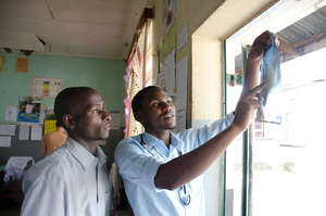 ECP's Alfunsi and Owen examining an x-ray