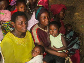 Mothers waiting to get children immunized