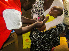 A trained health care worker giving immunizations