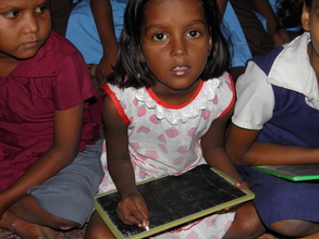 Child previously begging getting education