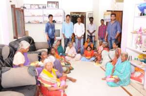 Charity in India giving food to poor seniorcitizen