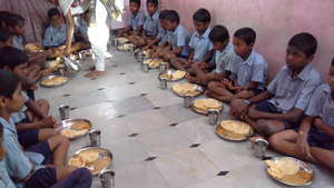 deprived children at breakfast section orphanage
