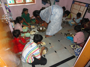 Underprivileged children enjoying at special lunch