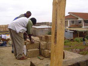 Workers starting construction of the upper floor