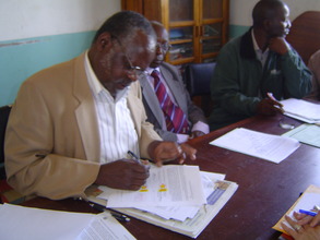 KHDP Project Manager signing grant agreement