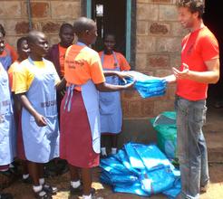 Colin working with NESEI's mobile clinic students.