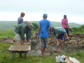 Volunteers working on the new building