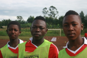 Babila (Center) with teammates