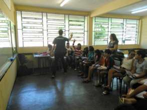 Volunteer giving the first native English class