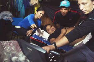 An expectant family views their baby's ultrasound