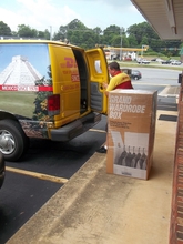 DHL pickup van and box with supplies you provided