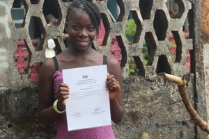 Geraldine holds certificate ebola survivor
