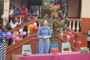 Alix addresses the kids at Dream Home