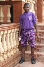 One of boys outside Dream Home