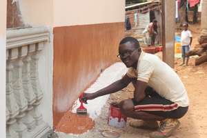 Alfred a volunteer - painting orphanage