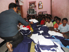 distribution of school uniforms to poor children